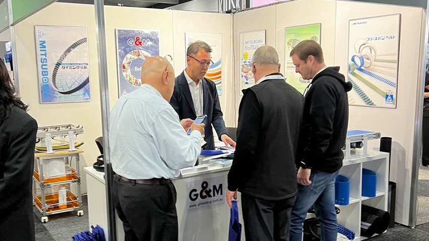 GM Belting technical team discussing conveyor belt solutions with visitors at Foodpro 2026