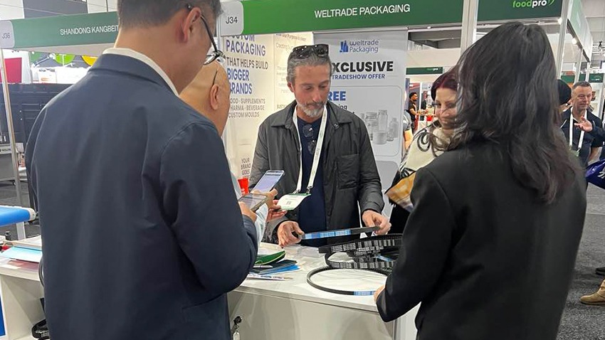 GM Belting discussing conveyor belt and industrial belt solutions with visitors at Foodpro 2026