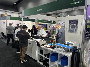 GM Belting team discussing industrial belt solutions with customers at Foodpro Melbourne 2026 exhibition